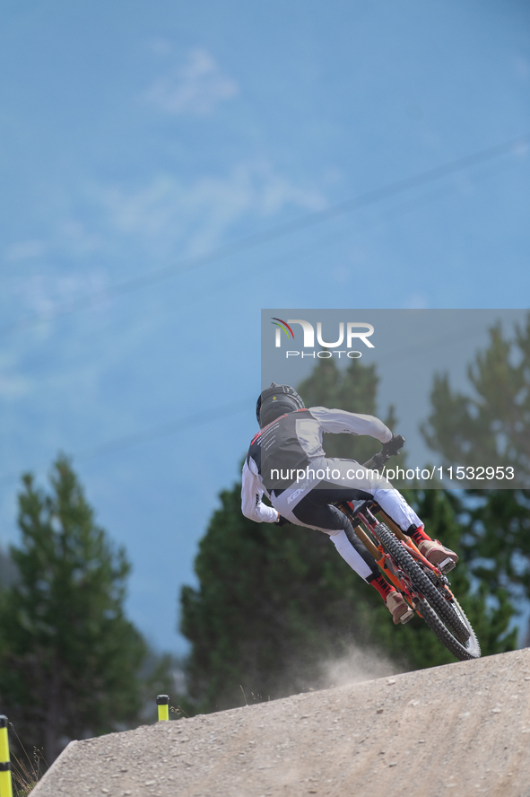 Kasper Woolley of Canada participates in the UCI Mountain Bike World Championships Men Downhill Race in Pal Arinsal, Andorra, on August 31,...