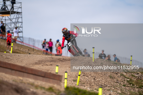 Henry Kerr of Ireland participates in the UCI Mountain Bike World Championships Men Downhill Race in Pal Arinsal, Andorra, on August 31, 202...