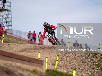 Henry Kerr of Ireland participates in the UCI Mountain Bike World Championships Men Downhill Race in Pal Arinsal, Andorra, on August 31, 202...