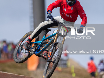 Benjamin Corral of Chile participates in the UCI Mountain Bike World Championships Men Downhill Race in Pal Arinsal, Andorra, on August 31,...