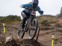 Luke Meier-Smith of Australia participates in the UCI Mountain Bike World Championships Men Downhill Race in Pal Arinsal, Andorra, on August...