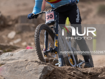 Luke Meier-Smith of Australia participates in the UCI Mountain Bike World Championships Men Downhill Race in Pal Arinsal, Andorra, on August...