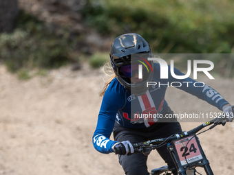 Lachlan Stevens-Mcnab of New Zealand participates in the UCI Mountain Bike World Championships Men Downhill Race in Pal Arinsal, Andorra, on...