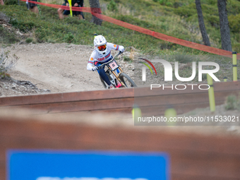 Oisin O Callaghan of Ireland competes in the UCI Mountain Bike World Championships Men Downhill Race in Pal Arinsal, Andorra, on August 31,...