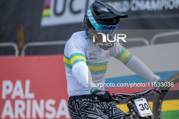 Luke Meier-Smith of Australia arrives at the finish line in the UCI Mountain Bike World Championships Men Downhill in Pal Arinsal, Andorra,...