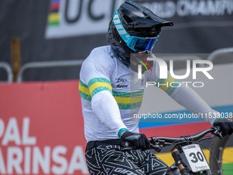 Luke Meier-Smith of Australia arrives at the finish line in the UCI Mountain Bike World Championships Men Downhill in Pal Arinsal, Andorra,...