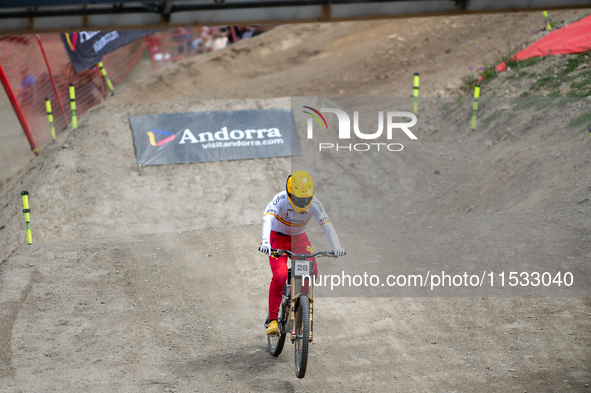 Angel Suarez of Spain arrives at the finish line in the UCI Mountain Bike World Championships Men Downhill in Pal Arinsal, Andorra, on Augus...