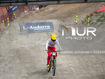 Angel Suarez of Spain arrives at the finish line in the UCI Mountain Bike World Championships Men Downhill in Pal Arinsal, Andorra, on Augus...