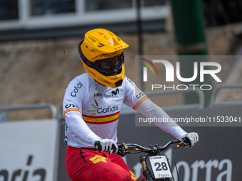 Angel Suarez of Spain arrives at the finish line in the UCI Mountain Bike World Championships Men Downhill in Pal Arinsal, Andorra, on Augus...