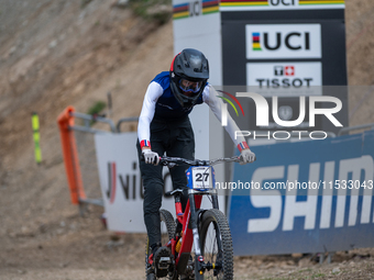 Nathan Pontvianne of France arrives at the finish line in the UCI Mountain Bike World Championships Men Downhill in Pal Arinsal, Andorra, on...