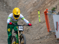 Oliver Davis of Australia arrives at the finish line in the UCI Mountain Bike World Championships Men Downhill in Pal Arinsal, Andorra, on A...