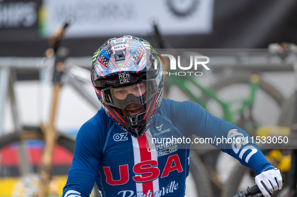 Dylan Maples of the USA arrives at the finish line in the UCI Mountain Bike World Championships Men Downhill in Pal Arinsal, Andorra, on Aug...