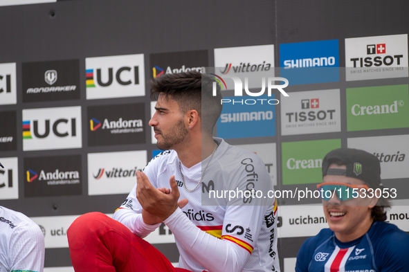 Angel Suarez of Spain arrives at the finish line in the UCI Mountain Bike World Championships Men Downhill in Pal Arinsal, Andorra, on Augus...