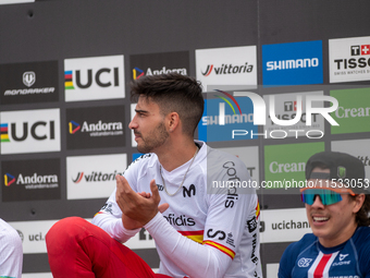 Angel Suarez of Spain arrives at the finish line in the UCI Mountain Bike World Championships Men Downhill in Pal Arinsal, Andorra, on Augus...