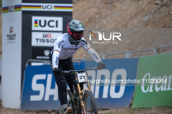 Max Hartenstern of Germany arrives at the finish line in the UCI Mountain Bike World Championships Men DownHill Andorra 2024 in Pal Arinsal,...