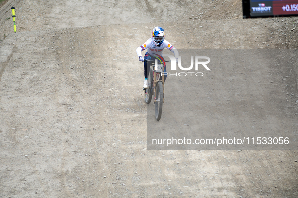 Laurie Greenland of Great Britain arrives at the finish line in the UCI Mountain Bike World Championships Men Downhill in Pal Arinsal, Andor...