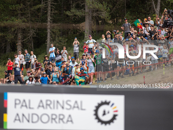 Spectators attend the UCI Mountain Bike World Championships Men Downhill in Pal Arinsal, Andorra, on August 31, 2024. (