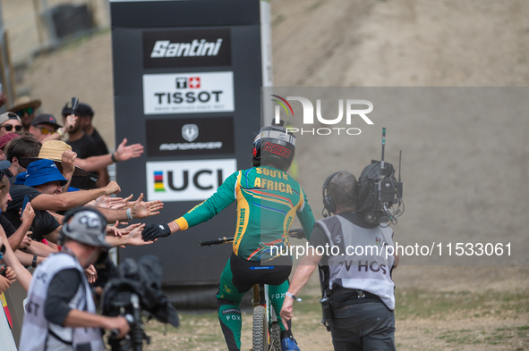 Greg Minnaar of South Africa makes his last descent in the UCI Mountain Bike World Championships Men Downhill in Pal Arinsal, Andorra, on Au...