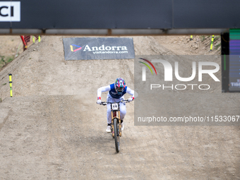 Thibaut Daprela of France arrives at the finish line in the UCI Mountain Bike World Championships Men Downhill in Pal Arinsal, Andorra, on A...