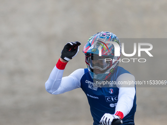 Thibaut Daprela of France arrives at the finish line in the UCI Mountain Bike World Championships Men Downhill in Pal Arinsal, Andorra, on A...