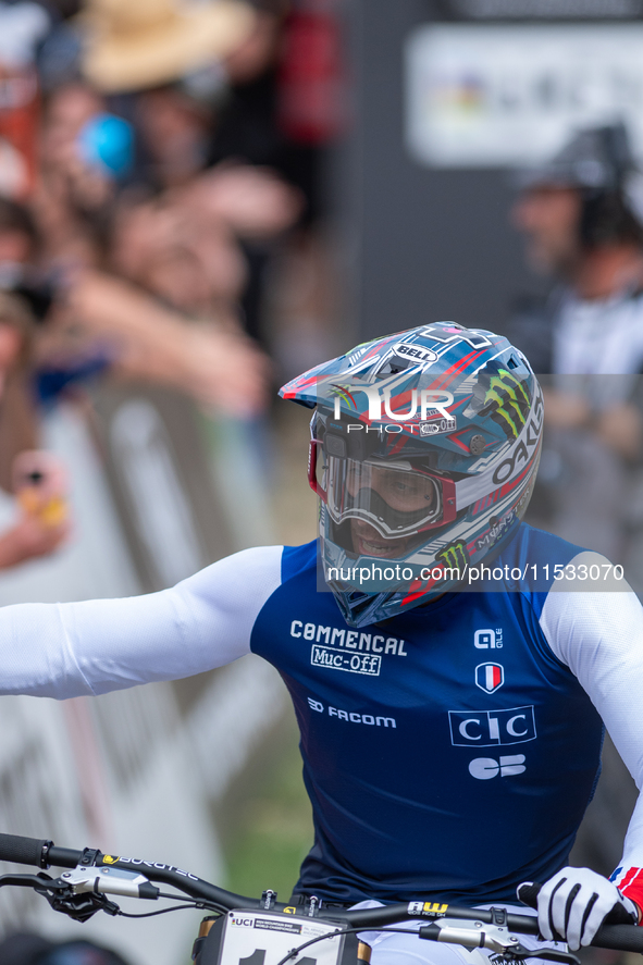 Thibaut Daprela of France arrives at the finish line in the UCI Mountain Bike World Championships Men Downhill in Pal Arinsal, Andorra, on A...