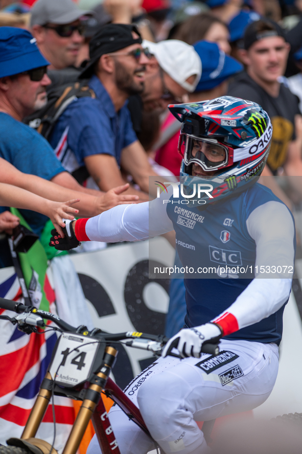 Thibaut Daprela of France arrives at the finish line in the UCI Mountain Bike World Championships Men Downhill in Pal Arinsal, Andorra, on A...