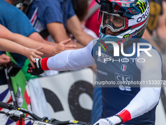 Thibaut Daprela of France arrives at the finish line in the UCI Mountain Bike World Championships Men Downhill in Pal Arinsal, Andorra, on A...