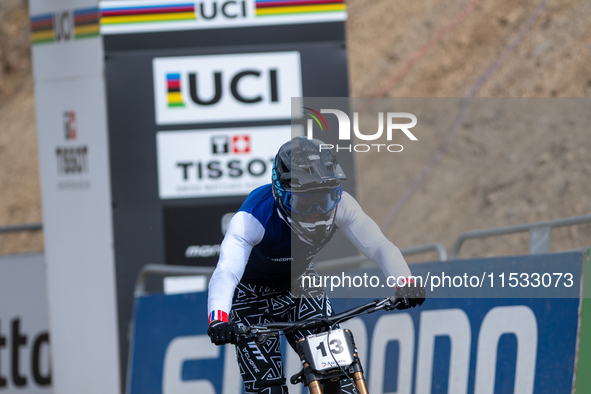 Remi Thirion of France arrives at the finish line in the UCI Mountain Bike World Championships Men Downhill in Pal Arinsal, Andorra, on Augu...