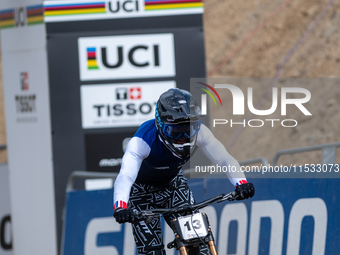 Remi Thirion of France arrives at the finish line in the UCI Mountain Bike World Championships Men Downhill in Pal Arinsal, Andorra, on Augu...