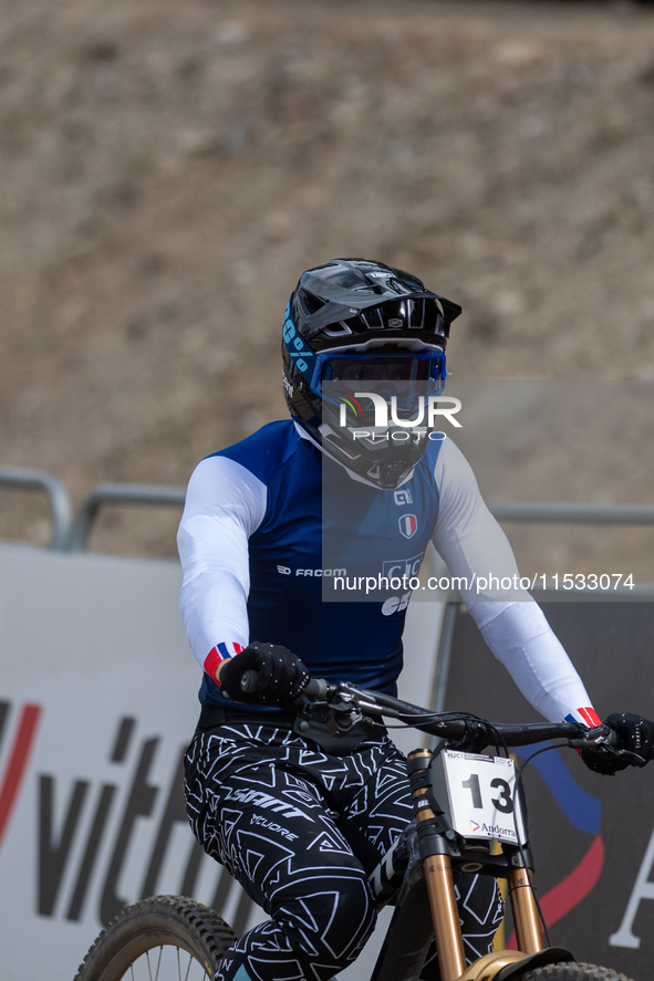 Remi Thirion of France arrives at the finish line in the UCI Mountain Bike World Championships Men Downhill in Pal Arinsal, Andorra, on Augu...