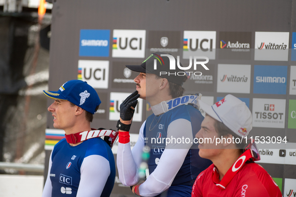 Riders await the definition of the race in the UCI Mountain Bike World Championships Men Downhill in Pal Arinsal, Andorra, on August 31, 202...