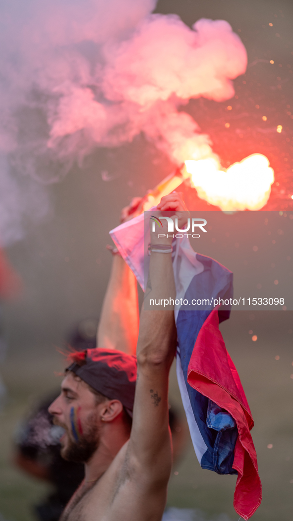 France fans attend the UCI Mountain Bike World Championships Men Downhill in Pal Arinsal, Andorra, on August 31, 2024. 