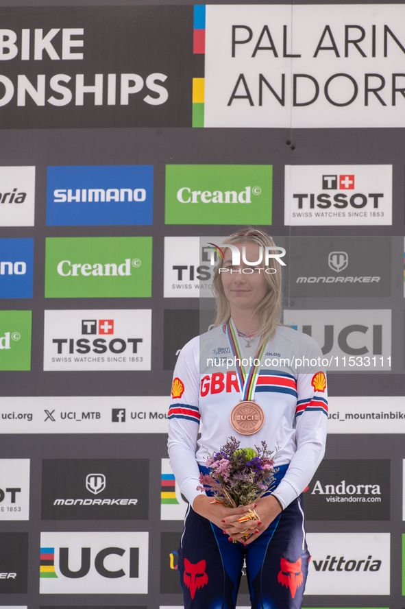 Tahnee Seagrave of Great Britain stands on the podium at the UCI Mountain Bike World Championships Women Downhill in Pal Arinsal, Andorra, o...