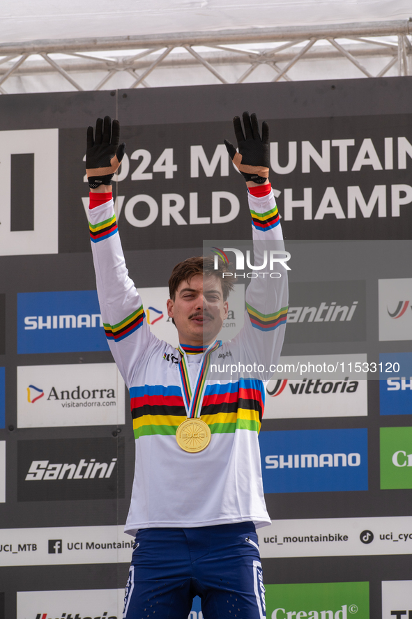 Loris Vergier of France stands on the podium at the UCI Mountain Bike World Championships Women Downhill in Pal Arinsal, Andorra, on August...