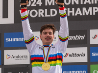 Loris Vergier of France stands on the podium at the UCI Mountain Bike World Championships Women Downhill in Pal Arinsal, Andorra, on August...