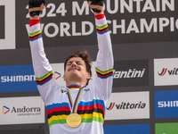 Loris Vergier of France stands on the podium at the UCI Mountain Bike World Championships Women Downhill in Pal Arinsal, Andorra, on August...