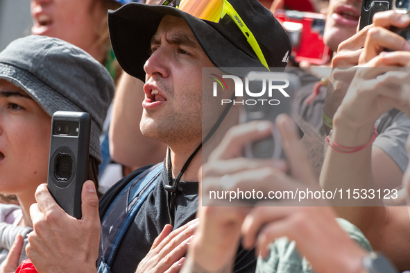 French fans celebrate the victory in the UCI Mountain Bike World Championships Men Downhill in Pal Arinsal, Andorra, on August 31, 2024. 