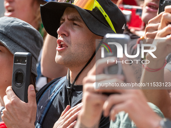 French fans celebrate the victory in the UCI Mountain Bike World Championships Men Downhill in Pal Arinsal, Andorra, on August 31, 2024. (