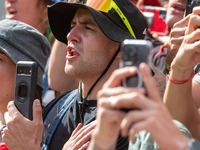 French fans celebrate the victory in the UCI Mountain Bike World Championships Men Downhill in Pal Arinsal, Andorra, on August 31, 2024. (