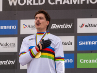 Loris Vergier of France stands on the podium at the UCI Mountain Bike World Championships Women Downhill in Pal Arinsal, Andorra, on August...