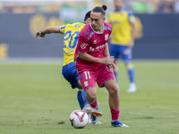 Luismi Cruz of CD Tenerife battles for the ball during the Liga Hypermotion match between Cadiz CF and CD Tenerife at Nuevo Mirandilla in Se...