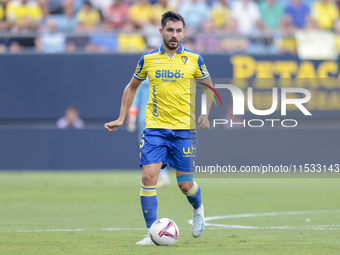 Victor Chust of Cadiz CF runs with the ball during the Liga Hypermotion match between Cadiz CF and CD Tenerife at Nuevo Mirandilla in Sevill...