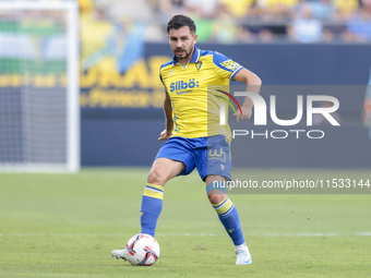 Victor Chust of Cadiz CF passes the ball during the Liga Hypermotion match between Cadiz CF and CD Tenerife at Nuevo Mirandilla in Seville,...