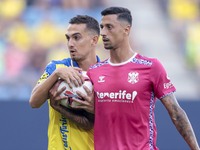 Gonzalo Escalante of Cadiz CF and Maikel Mesa of CD Tenerife during the Liga Hypermotion match between Cadiz CF and CD Tenerife at Nuevo Mir...