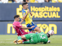 Ruben Sobrino of Cadiz CF competes for the ball with Tomeu Nadal of CD Tenerife during the Liga Hypermotion match between Cadiz CF and CD Te...