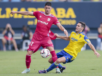 Joseba Zaldua of Cadiz CF competes for the ball with Waldo Rubio of CD Tenerife during the Liga Hypermotion match between Cadiz CF and CD Te...