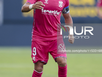 Angel Rodriguez of CD Tenerife runs with the ball during the Liga Hypermotion match between Cadiz CF and CD Tenerife at Nuevo Mirandilla in...