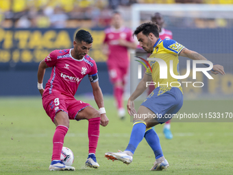 Angel Rodriguez of CD Tenerife battles for the ball during the Liga Hypermotion match between Cadiz CF and CD Tenerife at Nuevo Mirandilla i...