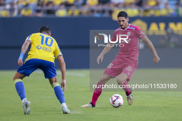 Yann Bodiger of CD Tenerife controls the ball during the Liga Hypermotion match between Cadiz CF and CD Tenerife at Nuevo Mirandilla in Sevi...