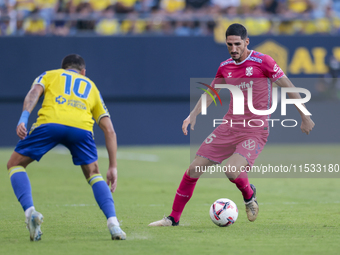 Yann Bodiger of CD Tenerife controls the ball during the Liga Hypermotion match between Cadiz CF and CD Tenerife at Nuevo Mirandilla in Sevi...